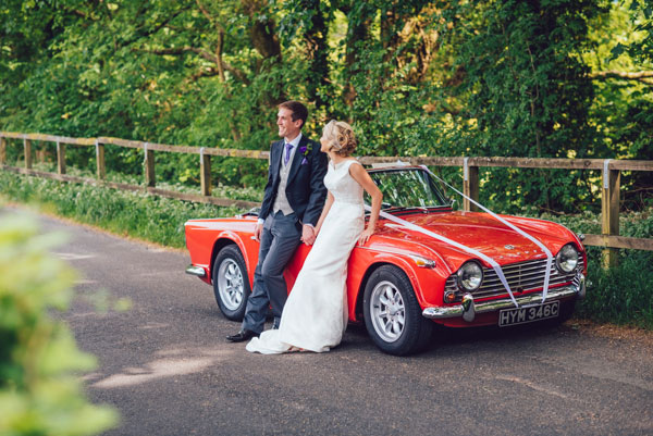 Laura & Marc With Triumph Convertible