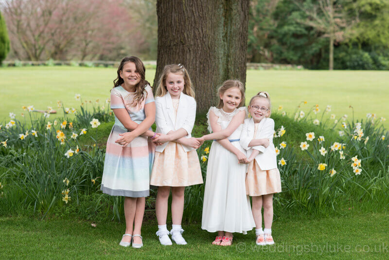 Girls in front of daffodils